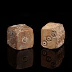 THE CURIOUS STORY OF DICE